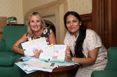 Caroline Dinenage and Priti Patel